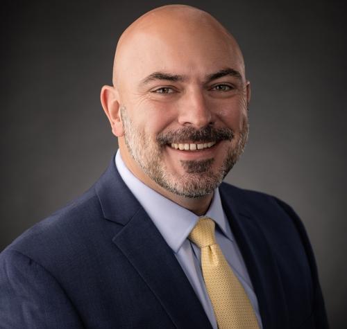 A headshot photograph of Gregg Synder, CEO