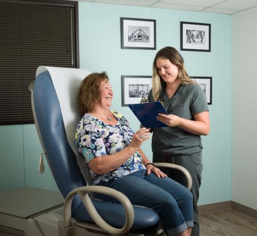 Doctor speaking with a patient about healthcare