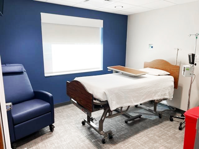 patient room in infusion center with bed