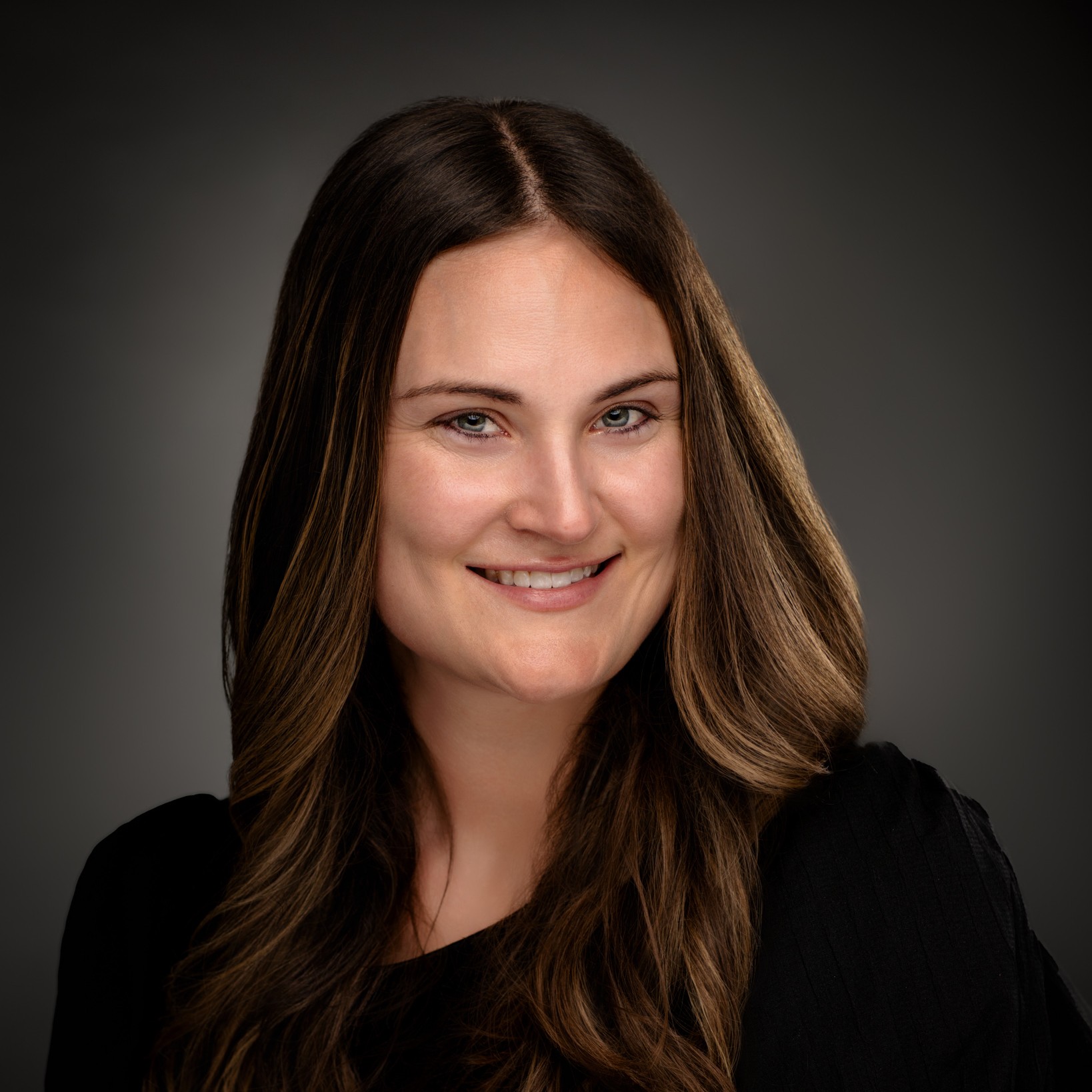 Headshot photograph of Alexis Murk, DNP-FNP
