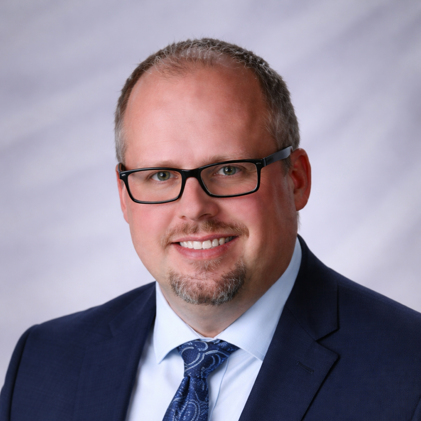 A headshot photograph of Josh Ulery, CEO